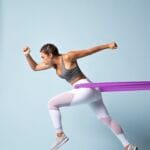 Home 2 young-woman-doing-fitness-sportswear