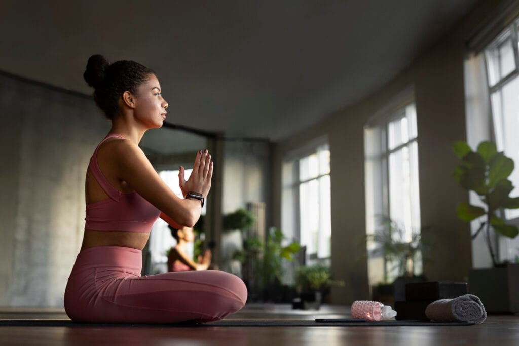 full-shot-woman-meditating-indoors mindset morning routine